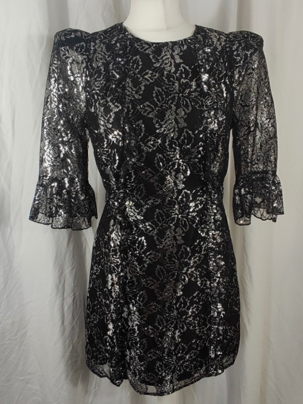 The Vampire’s Wife x H&M Metallic Black Lace Mini Dress